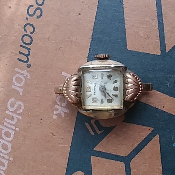 A vintage  benrus 10k r.g.p. bezel watch face no band